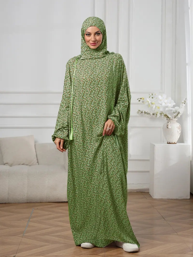 Plus-Size Fashion Floral Dress with Hood and Drawstring — featuring a loose fit, long lantern sleeves, and a modest yet casual style.