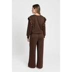 Women's tracksuit with ruffled top and trousers