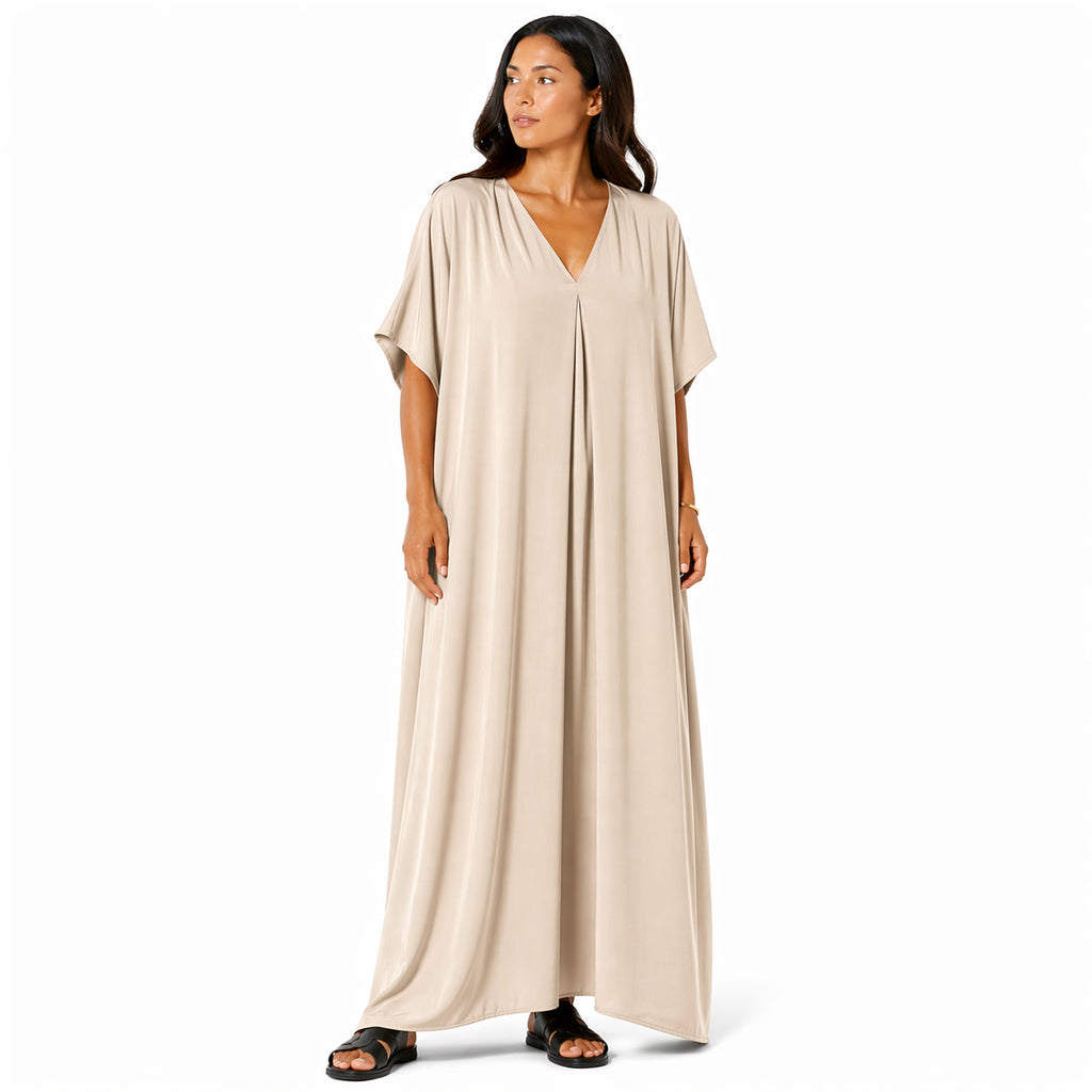 Women's long, flowy, oversized V-neck dress – chic and comfortable for summer.