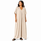 Women's long, flowy, oversized V-neck dress – chic and comfortable for summer.