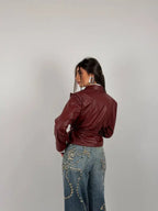 Jacket with belt at the waist