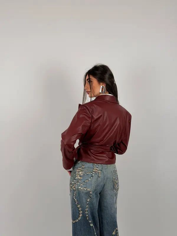 Jacket with belt at the waist