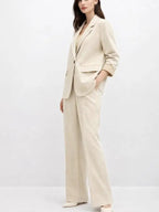 Suede Suit — Featuring a fluid, modern silhouette.