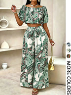 Women's solid-color wide-leg pant set, casual off-shoulder top and palazzo pants for summer, beach vacation wear for women.
