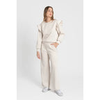 Women's tracksuit with ruffled top and trousers