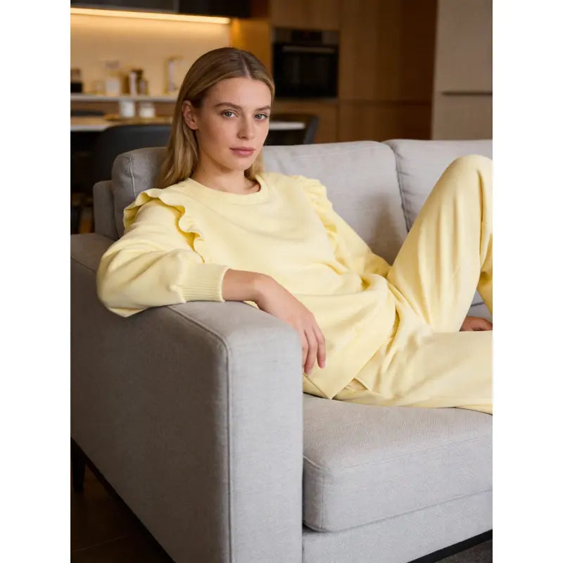 Women's tracksuit with ruffled top and trousers