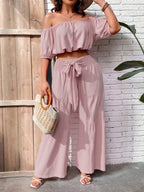 Women's solid-color wide-leg pant set, casual off-shoulder top and palazzo pants for summer, beach vacation wear for women.