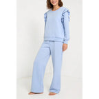 Women's tracksuit with ruffled top and trousers