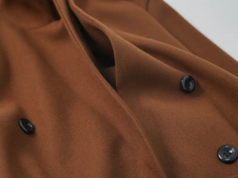 Long double-breasted coat with a belt and lapel, suitable for everyday wear and versatile