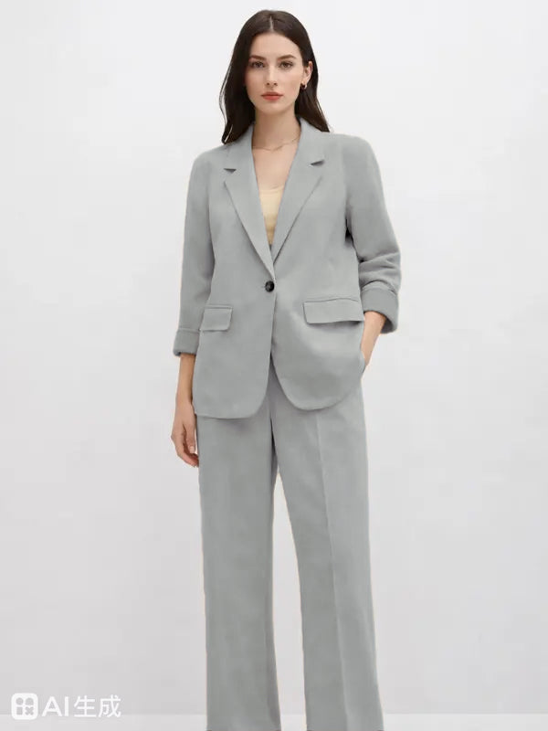Suede Suit — Featuring a fluid, modern silhouette.