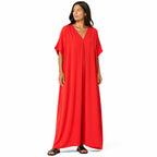 Women's long, flowy, oversized V-neck dress – chic and comfortable for summer.