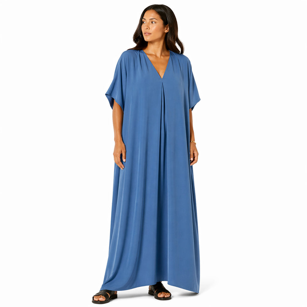 Women's long, flowy, oversized V-neck dress – chic and comfortable for summer.