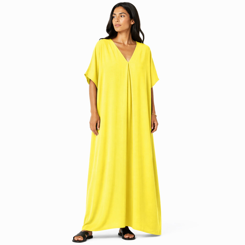 Women's long, flowy, oversized V-neck dress – chic and comfortable for summer.