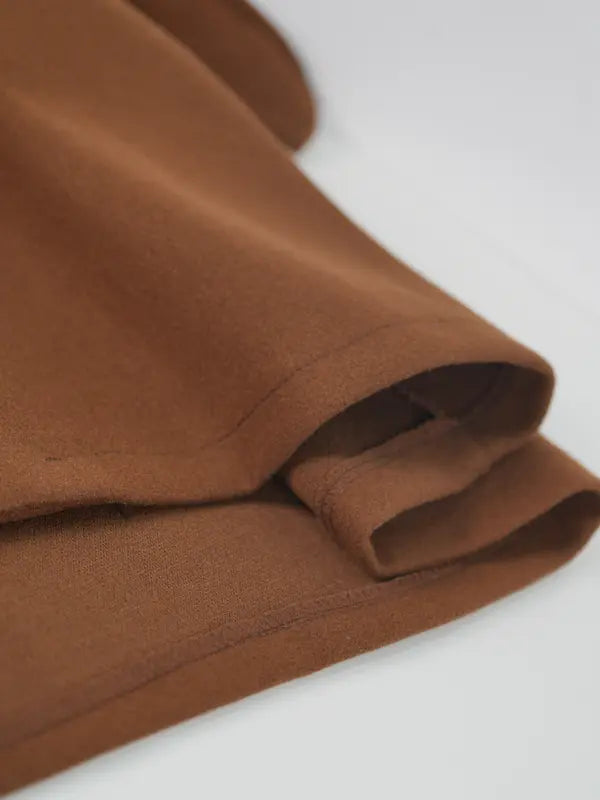Long double-breasted coat with a belt and lapel, suitable for everyday wear and versatile