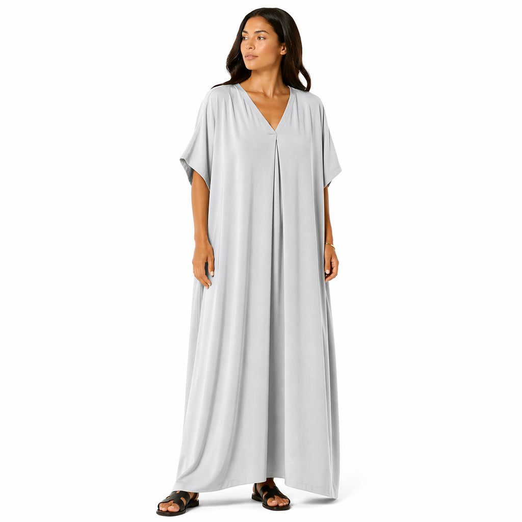 Women's long, flowy, oversized V-neck dress – chic and comfortable for summer.
