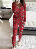 Women's V-NeckLeopard Print Loungewear Set. This relaxed-fit two-piece features a short-sleeve top and pants for effortlessly chic, casual comfort.