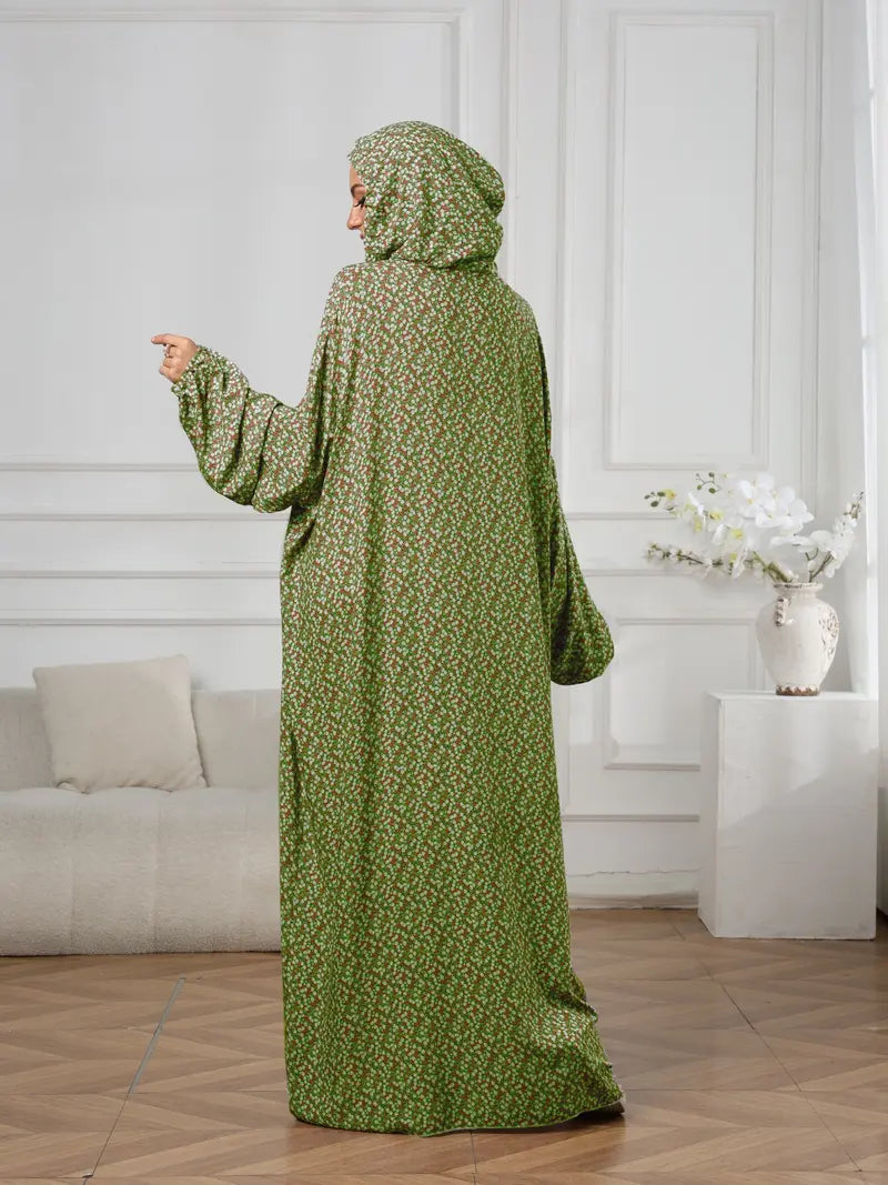 Plus-Size Fashion Floral Dress with Hood and Drawstring — featuring a loose fit, long lantern sleeves, and a modest yet casual style.