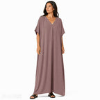 Women's oversized flowy V-neck maxi dress, chic and comfortable for summer, in a light and soft fabric for all occasions