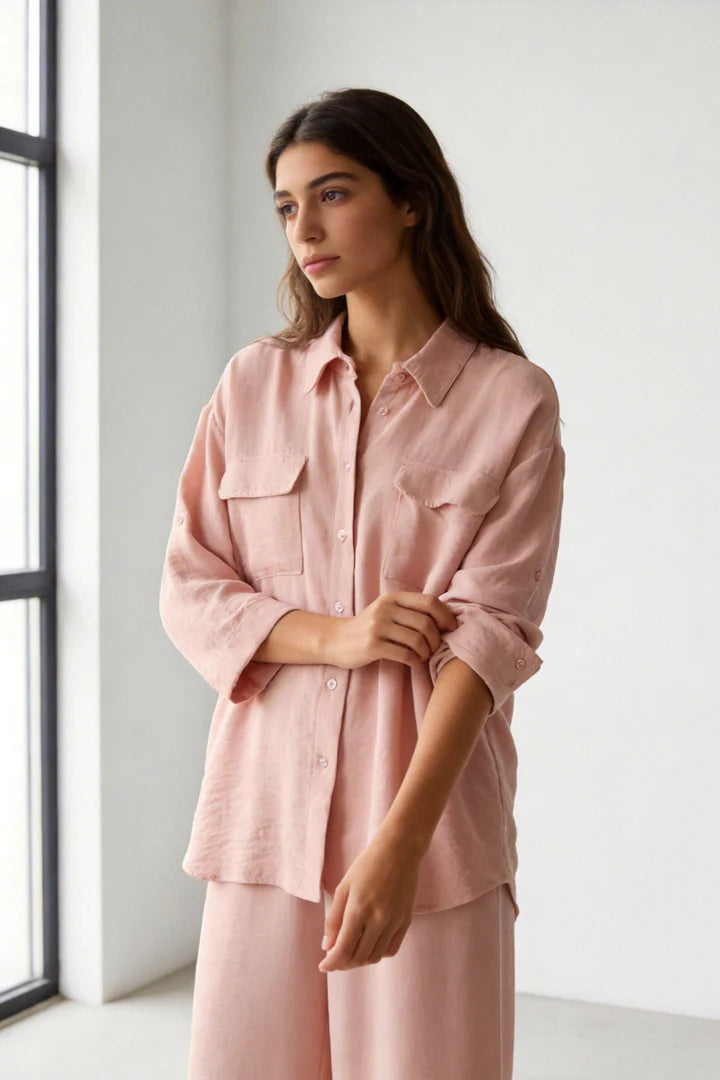 Two-piece set: loose-fitting shirt-style top, loose-fitting trousers, elastic waistband.