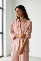 Two-piece set: loose-fitting shirt-style top, loose-fitting trousers, elastic waistband.