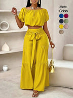 Women's solid-color wide-leg pant set, casual off-shoulder top and palazzo pants for summer, beach vacation wear for women.