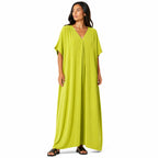Women's long, flowy, oversized V-neck dress – chic and comfortable for summer.