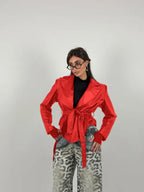 Jacket with belt at the waist
