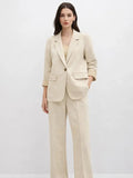 Suede Suit — Featuring a fluid, modern silhouette.
