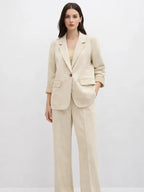Suede Suit — Featuring a fluid, modern silhouette.