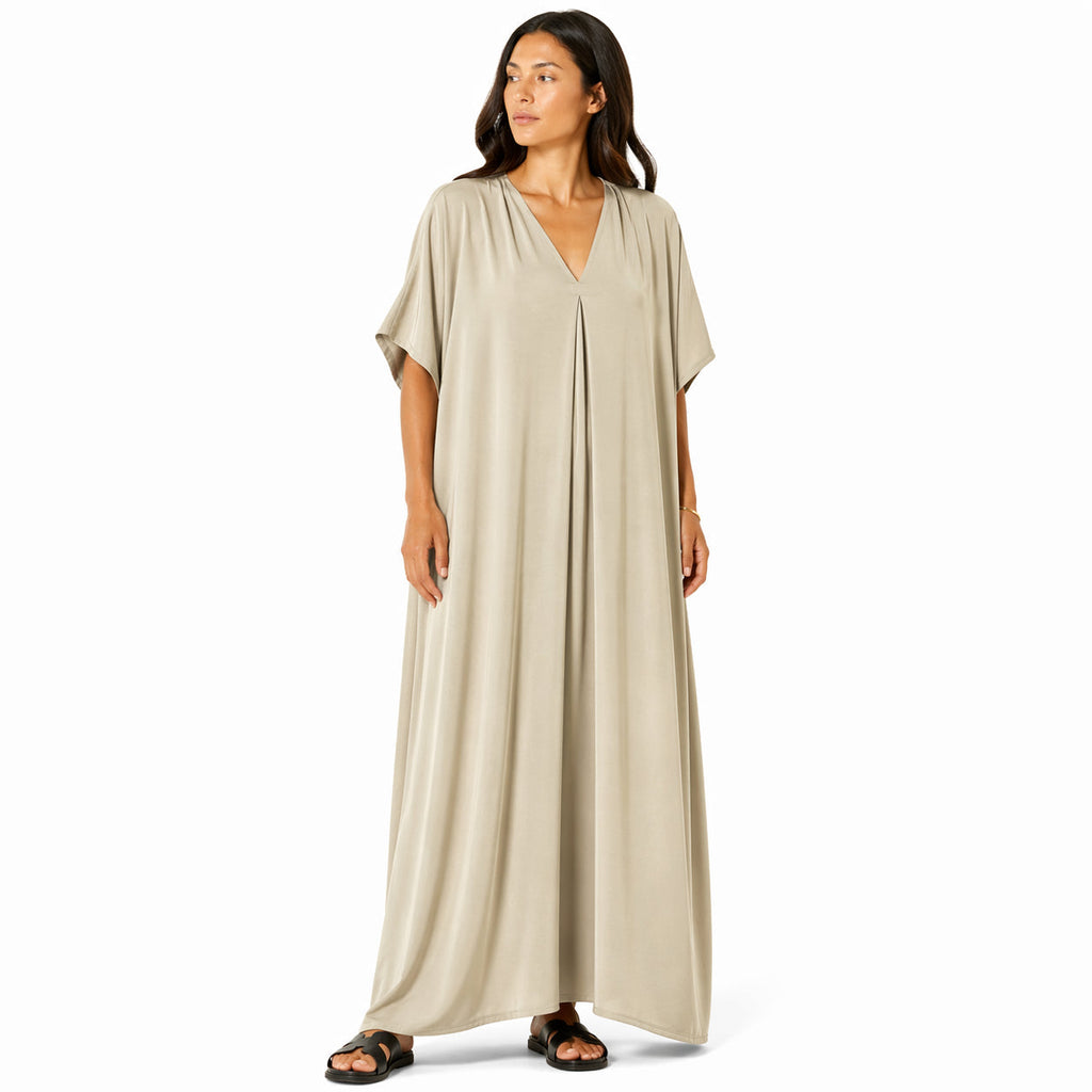 Women's long, flowy, oversized V-neck dress – chic and comfortable for summer.
