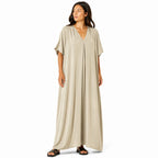 Women's long, flowy, oversized V-neck dress – chic and comfortable for summer.