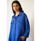 Two-piece set: loose-fitting shirt-style top, loose-fitting trousers, elastic waistband.