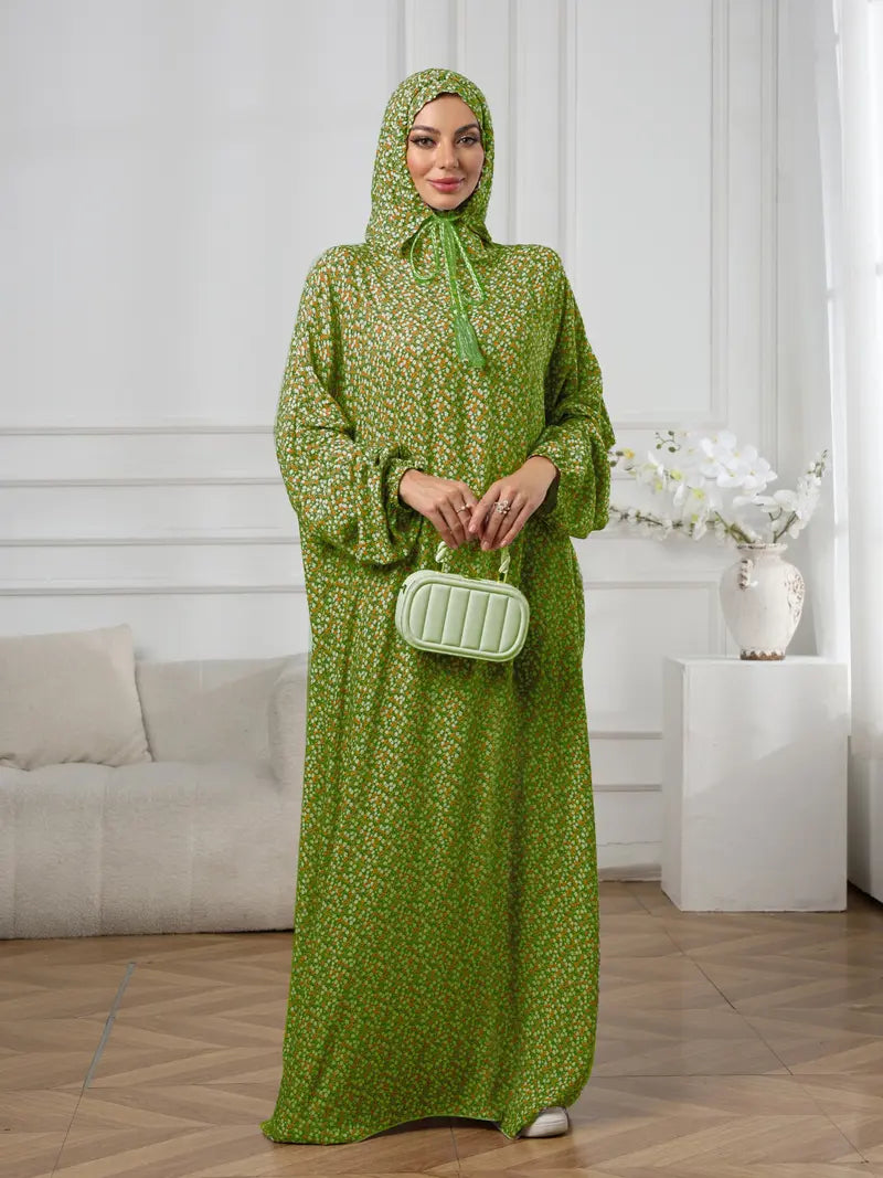 Plus-Size Fashion Floral Dress with Hood and Drawstring — featuring a loose fit, long lantern sleeves, and a modest yet casual style.