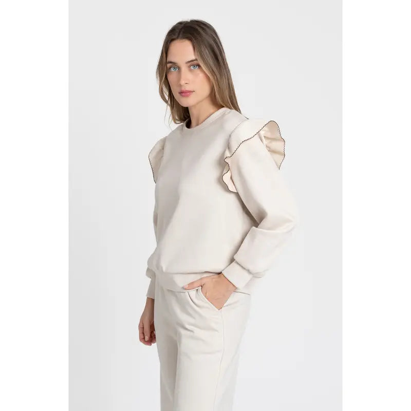 Women's tracksuit with ruffled top and trousers