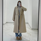 Coat with a belt at the waist