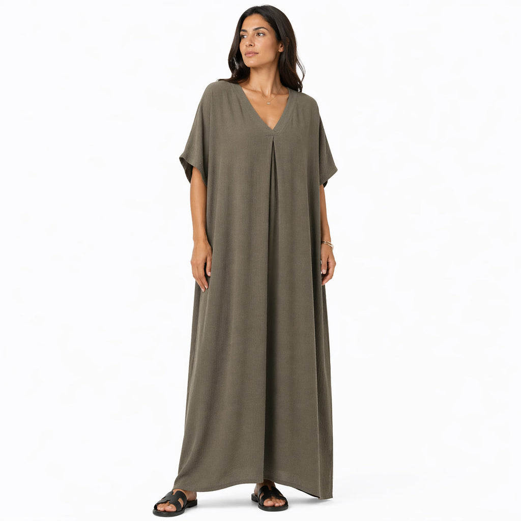 Women's long, flowy, oversized V-neck dress – chic and comfortable for summer.